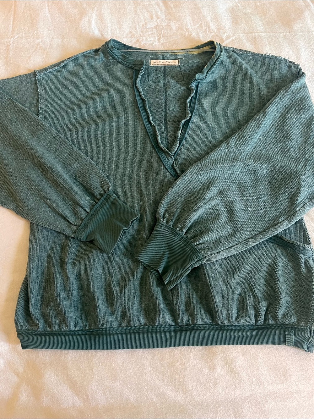 We The Free teal knit sweater with pale yellow trim